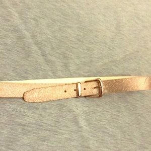 Woman’s silver sparkly belt